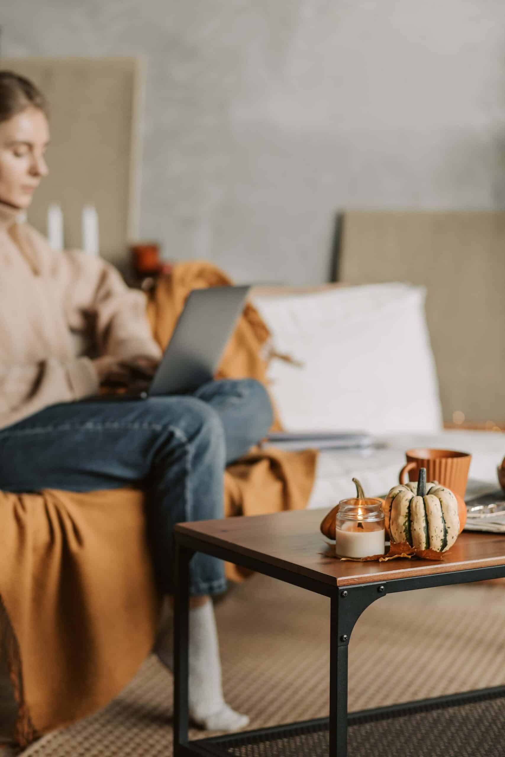 woman on personal growth websites on laptop