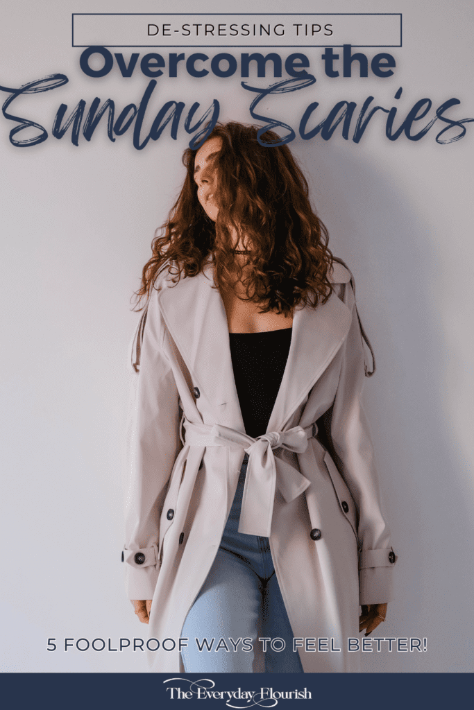 Woman wearing a trench coat, standing in front of a blank wall looking forlorn. The overlay text reads, "Overcome the Sunday Scaries – 5 Foolproof Ways to Feel Better!"