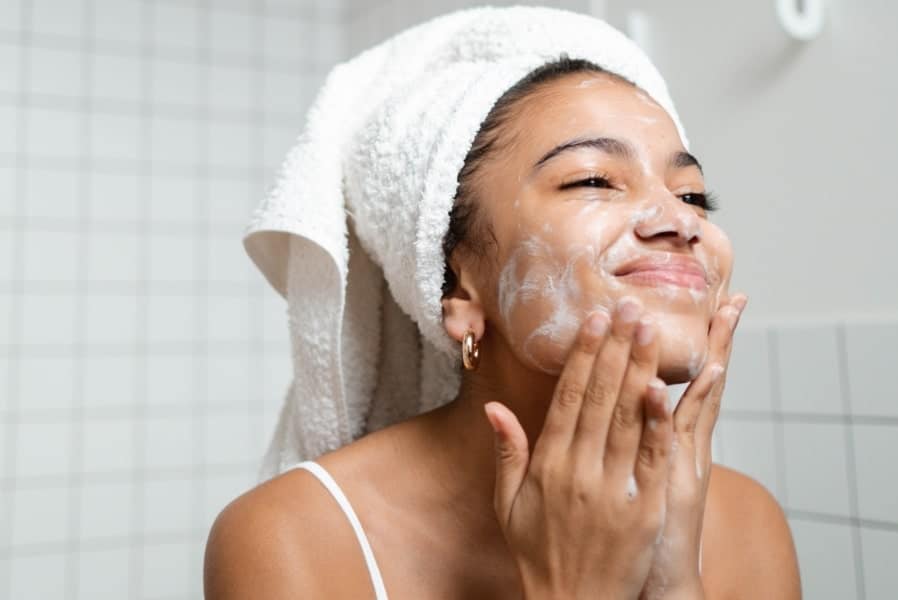 woman washing face