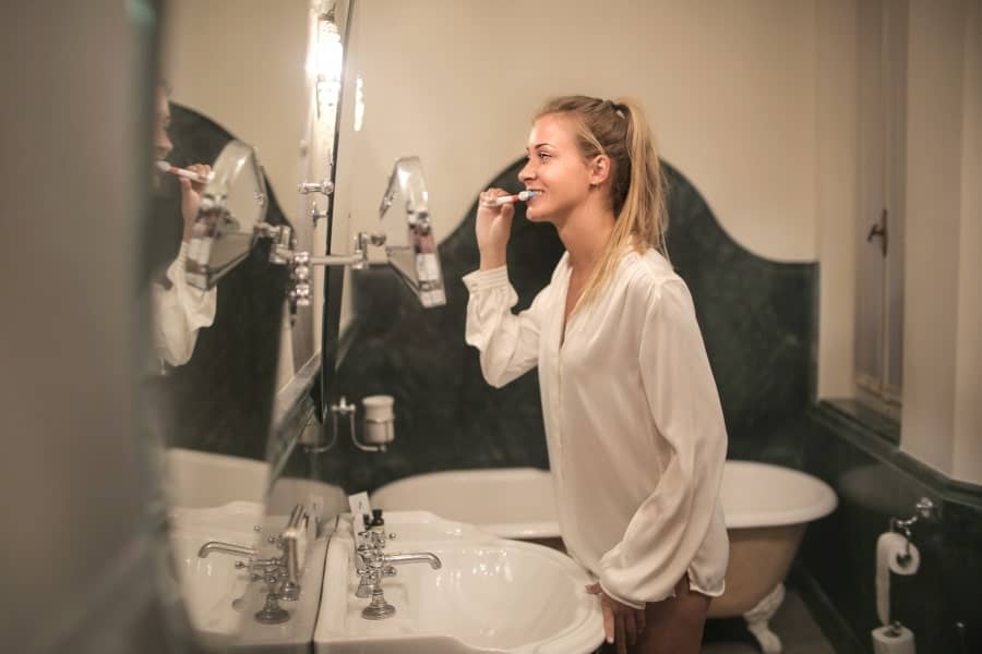 woman doing oral hygiene