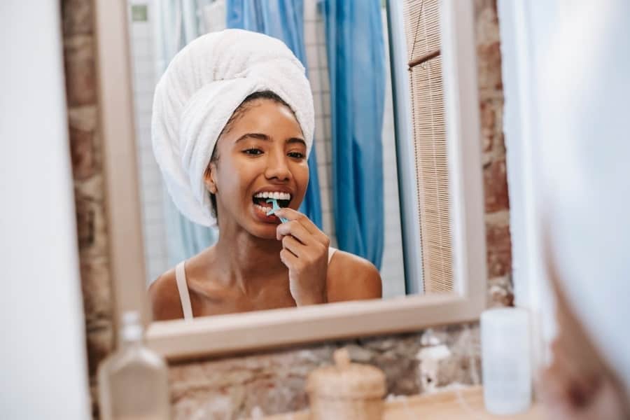 woman upgrading her flossing