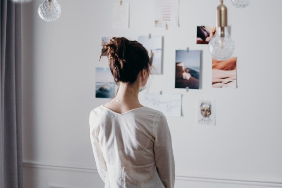 woman using vision board for de-stress activities