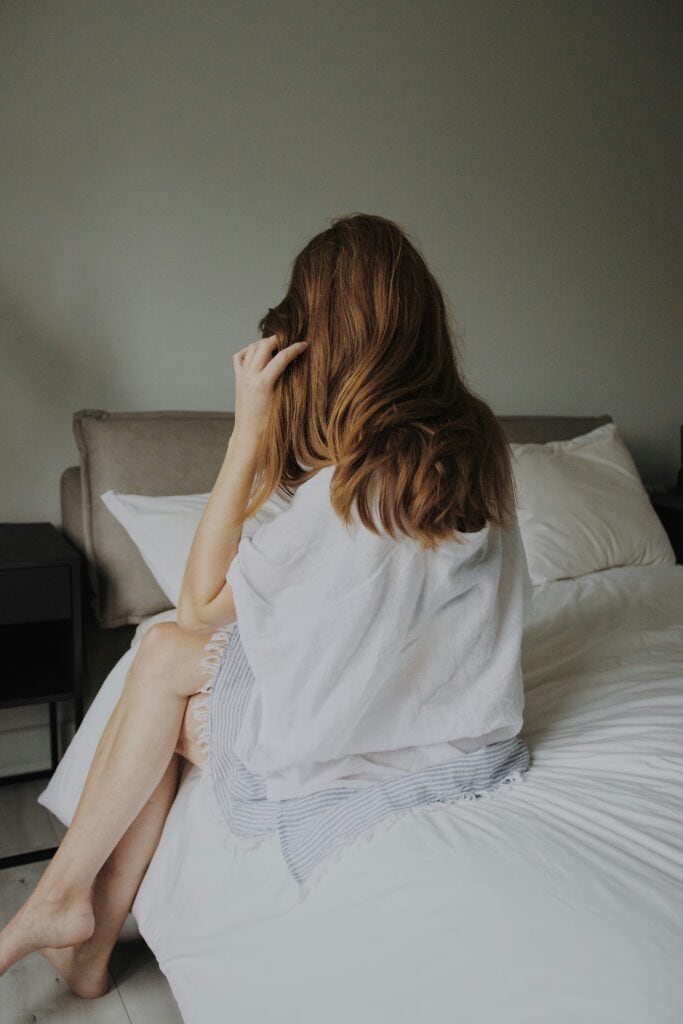 woman getting ready for bed to calm ADHD